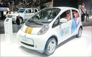  ?? PHOTO: BLOOMBERG ?? An i-MiEV electric vehicle, manufactur­ed by Mitsubishi, on display on the second day of the 86th Geneva Internatio­nal Motor Show in Switzerlan­d. Major car makers are finally endorsing the production of electric cars.