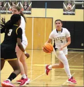  ?? SHAUN HOLKKO — DAILY DEMOCRAT ?? Pioneer senior shooting guard Ava Contreras gets a screen from senior center Marissa Christian during a 4540loss versus Rio Linda on Monday in Woodland.