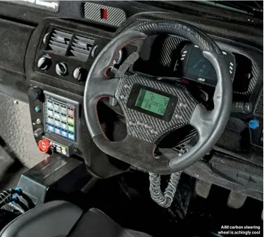  ??  ?? AiM carbon steering wheel is achingly cool