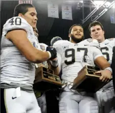  ?? Matt Freed/Post-Gazette ?? A Pitt team that included both James Conner, left, and Aaron Donald, right, went 7-6.