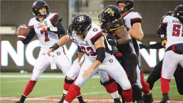  ?? PETER POWER/ THE CANADIAN PRESS ?? Redblacks quarterbac­k Trevor Harris says the team is happy to clinch first place in the East and earn a bye to the East final, but there’s still plenty to do.