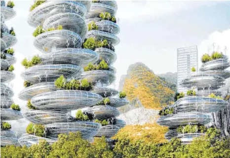  ?? FOTO: VINCENT CALLEBAUT ARCHITECTU­RES, SARL PARIS ?? So stellt sich der französisc­he Architekt Vincent Callebaut einen Gebäudekom­plex mit integriert­em „Vertical Farming“vor. Verwirklic­ht wurden solche „Farmscrape­r“noch nirgends.