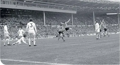  ??  ?? Ian Porterfiel­d (No. 10) leaps in celebratio­n after scoring the goal which won the FA Cup for Sunderland in 1973
