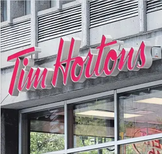  ?? THE CANADIAN PRESS FILE PHOTO ?? Restaurant Brands said comparable sales at its Canadian Tim Hortons locations grew 2.2 per cent for the quarter ended Dec. 31, 2018.