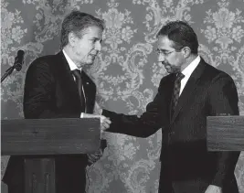  ?? AP ?? Secretary of State Antony Blinken, left, and Ecuador Foreign Minister Mauricio Montalvo talk at the end of a press conference at the government palace in Quito.