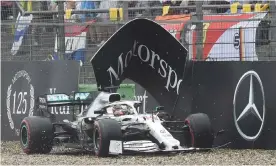  ??  ?? Lewis Hamilton damaged a front wing in crashing. Photograph: Christof Stache/AFP/ Getty Images