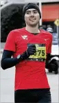  ??  ?? Atlanta runner Rob Mullett, a 2016 Olympian, won the men’s division of the Extra Yard 5K.