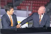  ?? STAFF FILE PHOTO ?? Ducks GM Bob Murray, right, says of head coach Dallas Eakins: “I think he’s doing a great job this year.”