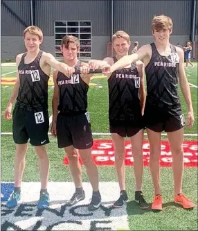  ?? Photograph courtesy Heather Wade ?? Pea Ridge Blackhawks Grandon Grant, Josiah Small, Tian Grant and Troy Ferguson comprised the 4x800-meter relay team that competed in the Meet of Champions Saturday, May 15. The team came in ninth with a time of 8:44.45.