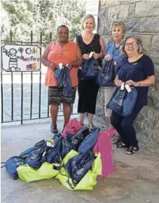  ??  ?? FOR THE CHILDREN: Child Welfare was grateful to receive care bags from the Rotary Anns recently. From left are Lizeka Sandlana and Susan Harty of Child Welfare, and Lenore Schäfer and Ria Greaves of the Rotary Anns