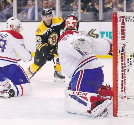  ?? MICHAEL DWYER/THE ASSOCIATED PRESS ?? The Boston Bruins’ David Krejci (46) scores on the Montreal Canadiens’ Carey Price during the second period of their game in Boston on Sunday. The Canadiens could not beat Boston’s Tuukka Rask and were shut out 4-0.