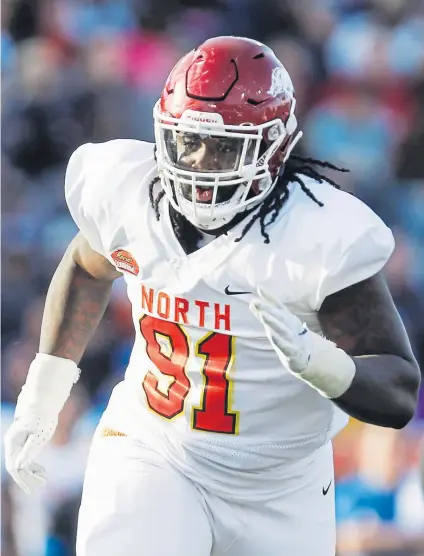  ?? Butch Dill, The Associated Press ?? McTelvin Agim was chosen by the Broncos in the third round (95th overall) of the 2020 NFL draft after lining up just about everywhere along the defensive line at Arkansas.