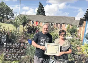  ??  ?? John and Margaret Mason, of Ditton, Widnes, were the winners of Halton Housing’s annual ‘Digital Garden Competitio­n’