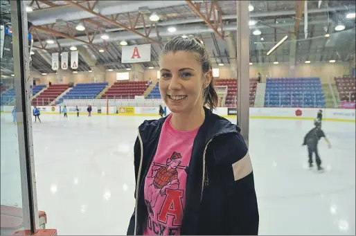  ?? KIRK STARRATT ?? Acadia Axewomen player Laura Patterson says she has spent pretty much her entire life on skates. She began the transition from ringette to hockey about two years ago.