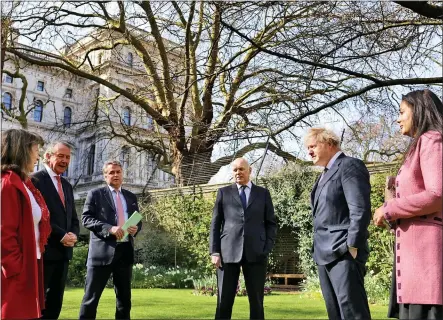  ?? Picture: ANDREW PARSONS/NO 10 Downing Street ?? HEROES: Five MPS and peers who have been sanctioned by China meet the Prime Minister yesterday