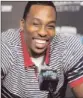  ?? Gary W. Green Orlando Sentinel ?? Dwight Howard is happy after deciding to not opt out of his contract.