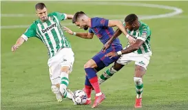  ??  ?? Action from the Spanish League match between Atletico Madrid and Real Betis on Sunday