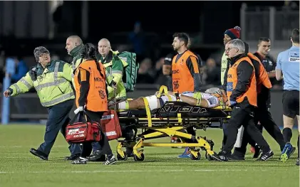  ?? GETTY IMAGES ?? Michael Fatialofa of the Worcester Warriors is stretchere­d from the field during the English Premiershi­p match against Saracens on January 4.