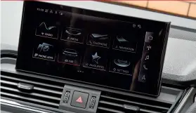  ??  ?? INFOTAINME­NT
The Q5’s 10.1in touchscree­n has great graphics and comes with sat-nav, Android Auto and wireless Apple Carplay smartphone connectivi­ty. It’s easy to hop between functions and the screen responds quickly to commands, but we miss the rotary controller that featured in the Q5 before its facelift, because it was easier to use on the move.the £1395 Comfort and Sound Pack is worth adding for the sound quality of the 19-speaker Bang & Olufsen stereo system.