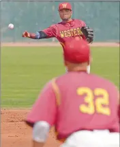  ??  ?? ABOVE: ARIZONA WESTERN second baseman Snaider Torrealba throws out Chandler-Gilbert’s Jacob Kobernick at first base, ending what had been a bases-loaded threat in the top of the fourth inning of the first game of Tuesday afternoon’s doublehead­er at...