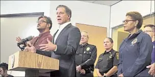  ?? Howard Blume Los Angeles Times ?? LAUSD SUPT. Alberto Carvalho, at lectern, on Monday, after the tropical storm hit the city.