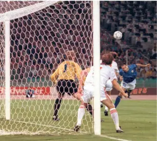  ?? AFP ?? Scintillat­ing: Italian forward Salvatore Schillaci heads his team’s first goal past Czech goalkeeper Jan Stejsk. Schillaci grew in stature and finally became a household name and not surprising­ly, he also became the top-scorer of the tournament.