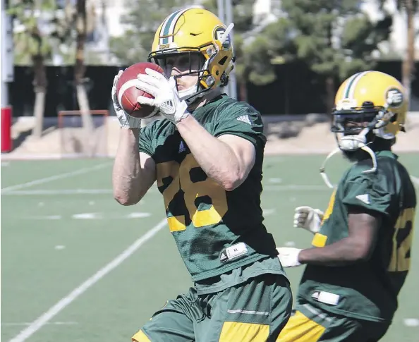  ?? TRENT SCHNEIDER ?? Second-year Edmonton Eskimos defensive back Jordan Hoover, centre, is grieving the loss of his friend Lam Diing.