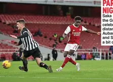  ??  ?? PARTY NIGHT Saka scores, the Gunners celebrate at distance but Aubameyang and Saka get a bit closer