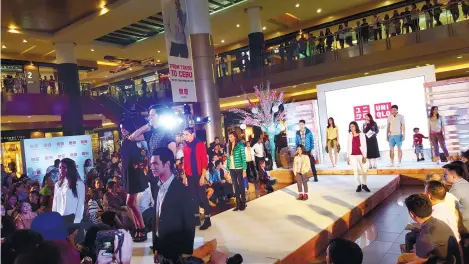  ??  ?? LIFEWEAR. Uniqlo held a fashion show at the SM City North Wing as part of pre-opening activities last Oct. 21 to launch its first branch in Cebu.