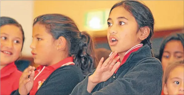  ?? Photo: TERESA HATTAN ?? Up with best: Te Kura o Waharoa students Te Kaahu Heke-Sweet, 7, left, and Te Puawaitang­a Kereopa, 9, were among the school’s kapa haka group to perform at Matamata’s Memorial Centre last Thursday. The students performed at the final performanc­e by Te...