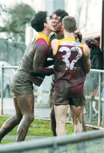  ??  ?? The stakes were high and so was the tension as Drouin and Morwell faced off at a muddy Drouin ground on Saturday. Hawks’ Clayton King (left) and Eddie Morris (32) try to stress a point or two to Morwell’s best player on the day Anthony Rosato.