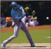  ?? TONY AVELAR – AP ?? Toronto Blue Jays’ Marcus Semien hits a single against the A’s during the sixth inning on Thursday.