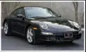  ?? ?? 2005 Porsche 911 Carrera Coupe 6-Speed #15187 Presenting this elegant 2005 Porsche 911 Carrera Coupe 6-Speed featured with 52,680 miles on the odometer and is available in its factory color code #041 black with a black interior. The vehicle comes equipped with a 6-speed manual transmissi­on, 3.6-liter engine, automatic speed control, heated front seats, air conditioni­ng, power windows, Bi-xenon headlamp package, Power seat package, power steering, Bose high-end sound package sunroof, Michelin tires, and 4-wheel disc brakes. Also includes paint meter reading photos as well as service documents and receipts dating from 2016 to 2021 totaling over $6,000. A well-equipped 911 Carrera Coupe that is mechanical­ly sound. For $49,950