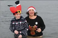  ??  ?? Maeve and Paddy Moran from Tralee pictured looking very festive as they took part in the ‘Polar Plunge’ at Fenit.