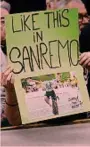  ?? ?? I tifosi di Tadej lo volevano così Ecco uno dei tantissimi cartelli che i tifosi di Pogacar avevano esposto alla partenza della Sanremo a Pavia. «Come questo alla Sanremo»: la foto è una vittoria al Tour