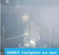  ??  ?? KUWAIT: Firefighte­rs are seen inside an apartment where a fire was reported recently.