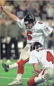  ??  ?? Atlanta Falcons’ Morten Andersen, shown kicking a 39-yard field goal from the hold of Dan Strazinsky (4) to win the NFC Championsh­ip in 1999, is entering the Pro Football Hall of Fame as the leading scorer in NFL history with 2,544 points.