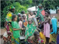  ?? JEROME DELAY/ THE ASSOCIATED PRESS ?? Muslim children gather at a water pump outside a mosque in Bangui Thursday. The region has been in chaos since March 2013.