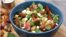  ?? KARON LIU/TORONTO STAR ?? Pack quinoa topped with chickpeas, feta, tomatoes and mint for lunch.