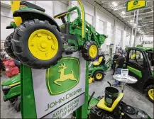  ?? NATI HARNIK / AP 2018 ?? Sales of agricultur­al and turf equipment, Deere & Co.’s biggest operation, slid 6% in the third quarter and profits fell 24% the company said.