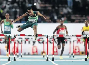  ?? /PHOTOS / ROGER SEDRES/GALLO IMAGES ?? Sokwakhana Zazini en route to victoy in the 400m hurdles final at the World U18 Champs in Kenya.
