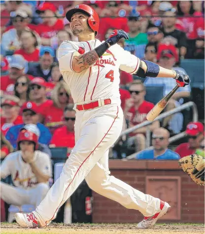  ?? | JEFF ROBERSON/AP ?? Cardinals catcher Yadier Molina will have to play with a splint to protect a torn ligament in his left thumb.