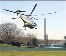  ?? AP photo ?? Marine One, with President Donald Trump and first lady Melania Trump aboard, lifts off the South Lawn of the White House on Wednesday in Washington, enroute to Andrews Air Force Base and then onto Florida.