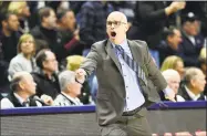  ?? Stephen Dunn / Associated Press ?? Right, UConn coach Dan Hurley reacts to a call during Thursday night’s 78-71 loss to Temple at Gampel Pavilion in Storrs.