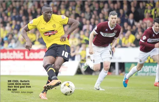 ?? PICTURES: Action Images ?? MR COOL: Burton’s Lucas Akins scores their third goal from the spot