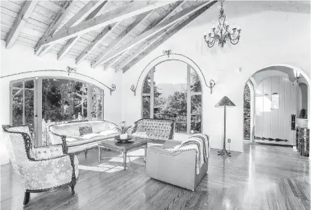  ??  ?? Actor Natalie Zea and her husband, Travis Schuldt, paid $2.15 million US for this home in Glendale, Los Angeles County. The Spanish-style estate is awash in character details, including three tiled fireplaces. The half-acre property comes with...