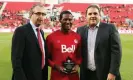  ?? ?? Canada Soccer officials Peter Montopoli, left, and Victor Montaglian­i, right, stand with Patrice Bernier before a 2014 friendly between Canada and Jamaica at Toronto’s BMO Field. Photograph: Vaughn Ridley/ Getty Images