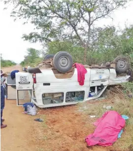  ?? ?? SAD SIGHT: Body of a pregnant woman (covered in red blanket)