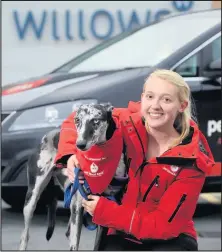  ??  ?? Emma Birch with a donor dog.