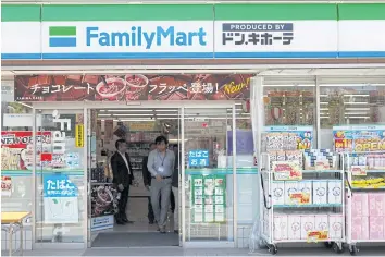  ??  ?? ABOVE The storefront of a joint FamilyMart/ Don Quijote convenienc­e store is pictured in Tachikawa, Tokyo.
